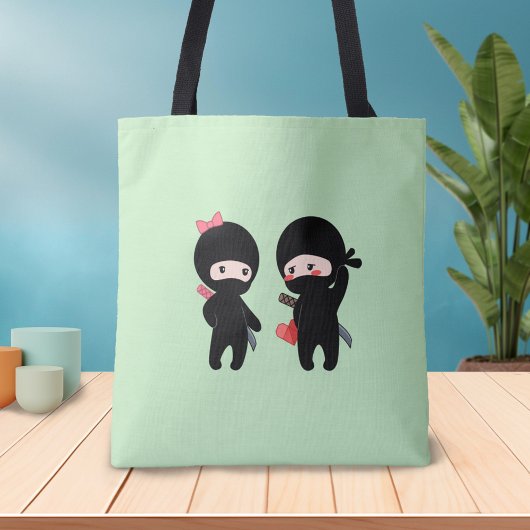 Ninja Pair, een jongen en een meisje op groen Tote Bag