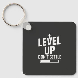 Niveau omhoog, ga niet zitten sleutelhanger