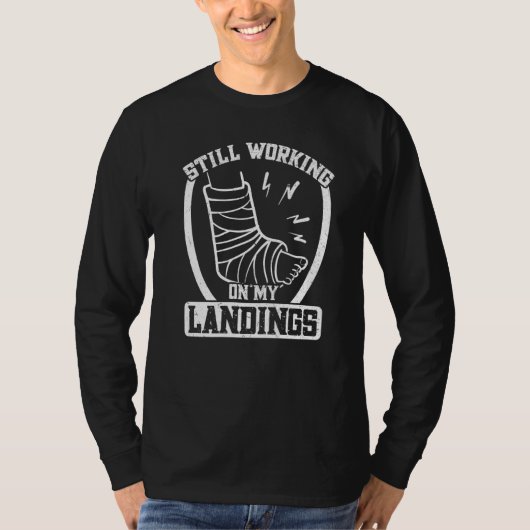 Nog bezig met mijn landingen Gebroken botbreuk T-shirt (Voorkant)