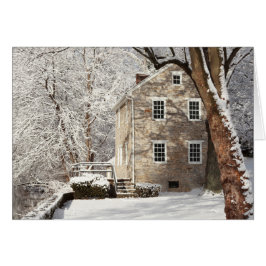 Nog steeds huis met sneeuwbomen