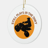 Nog steeds speelt in het vuil keramisch ornament (Links)