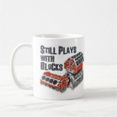 Nog steeds speelt met blokken koffiemok (Links)