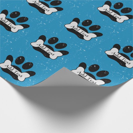 Noodlijdende hond poot print en bot op baby blauw cadeaupapier (Hoek)
