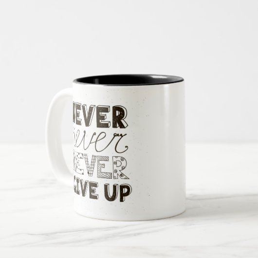 Nooit opgeven tweekleurige koffiemok (Voorkant links)