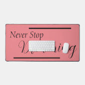 "Nooit stoppen met dromen" zinsnede zwart beletter Bureaumat (Keyboard & Muis)