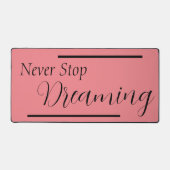 "Nooit stoppen met dromen" zinsnede zwart beletter Bureaumat (Voorkant)