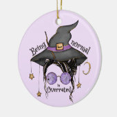 Normaal zijn is te hoog beoordeeld keramisch ornament (Links)