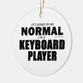 Normale toetsenbordspeler keramisch ornament (Links)