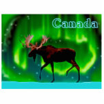 Northern Lights Moose - Canada Fotobeeldje Magneet<br><div class="desc">Een ooit zo licht gestileerd afbeelding van een mos gesilhoueterd tegen de Noordelijke Lichten. De tekst "Canada" wordt weergegeven in blauw en wit glanzend.</div>