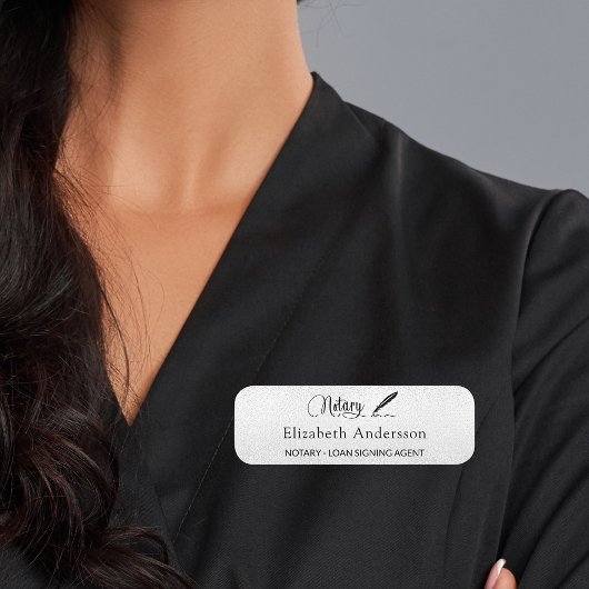Notarisagent voor ondertekening van leningen zilve naamplaatje