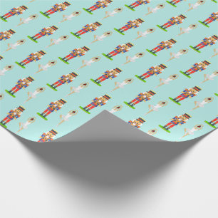 Notenkraker en balletdanseres op licht teal cadeaupapier