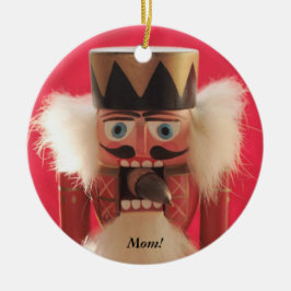 Notenkraker met eikel rond ornament