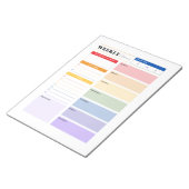 Notitieblok van de Rainbow Weekly Planner van foto (Schuin)