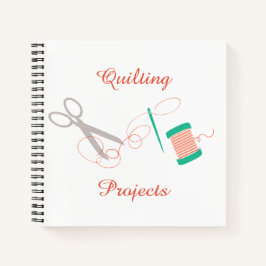 Notitieboek met naalden en draad