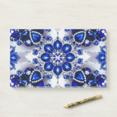 Notities met blauw-witte kleuren post-it® notes (Op bureau)