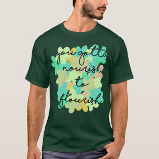 nourish om te floreren t-shirt