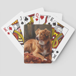 Nova Scotia Duck Terrier in herfstbladeren valt Pokerkaarten