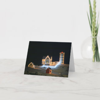 Nubble Light op een sneeuwnacht. Opmerkingskaart Notitiekaartje