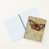 Nummers van notitieblokken met sepia-vlinder, in n notitieboek (Binnen)