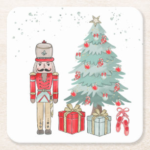 Nutkraker, kerstboom en cadeaus kartonnen onderzetters