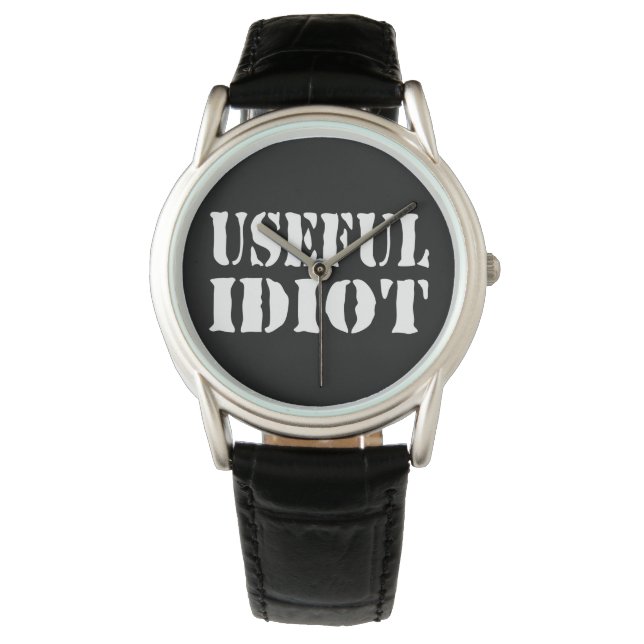 NUTTIGE IDIOOT HORLOGE (Voorkant)