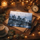NYC Unforgettable Night Skyline  Briefkaart<br><div class="desc">NYC: unforgettable, electric, and endlessly inspiring. This striking postcard captures the unforgettable beauty of the New York City skyline glowing against the night sky. The shimmering reflections dancing across the water create a dramatic and romantic view of Manhattan that perfectly reflects the energy of the city that never sleeps. Whether...</div>