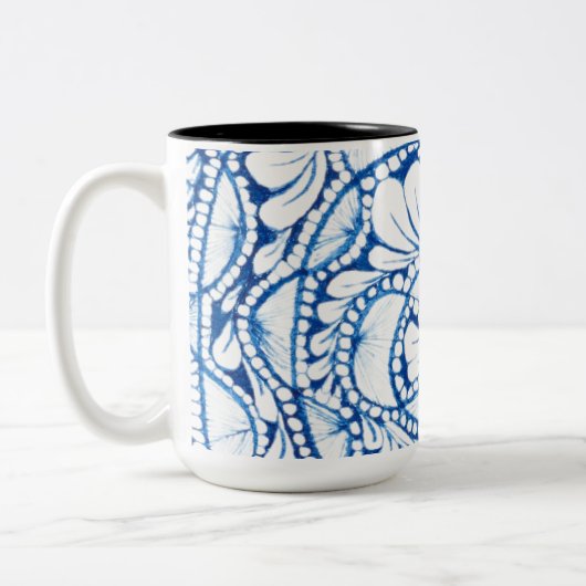O&A Tweekleurige koffiemok (Links)