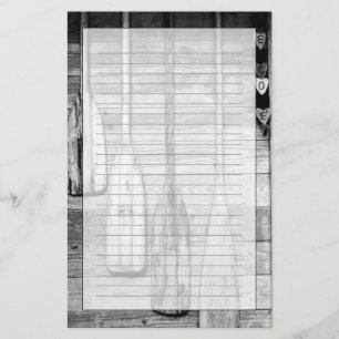 Oars worden opgehangen op houten schuur in Big Cyp Briefpapier