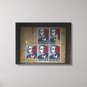 Obama signeert in een dichtgesplinterd raam van ee canvas afdruk