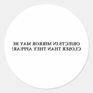 OBJECTEN IN SPIEGEL KUNNEN DICHTERBIJ ZIJN ....... RONDE STICKER