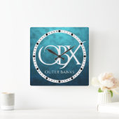 OBX Buitenste banken NC op blauwe waterachtergrond Vierkante Klok (Huis)