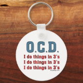 OCD I Doe dingen in 3's Sleutelhanger (Achterkant)