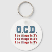 OCD I Doe dingen in 3's Sleutelhanger (Achterkant)