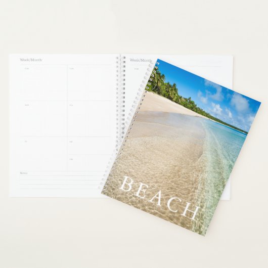 Oceaan getijde op een tropisch strand planner (Display)