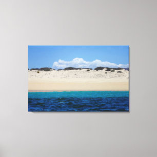 oceaangolven op zandstrand onder blauwe hemel canvas afdruk