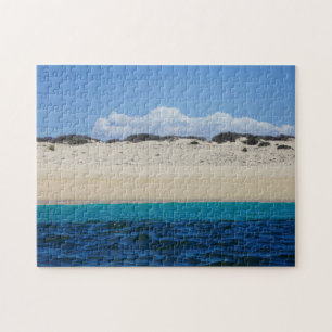 oceaangolven op zandstrand onder blauwe hemel legpuzzel