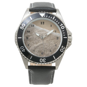 Oceaanwit wassen op het strand horloge