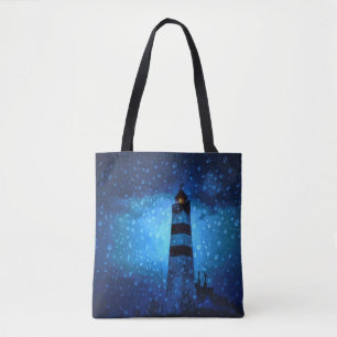 Ocean vuurtoren een donkerblauwe nacht met druppel tote bag