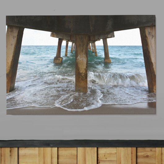 Oceanview van onder de pier canvas afdruk
