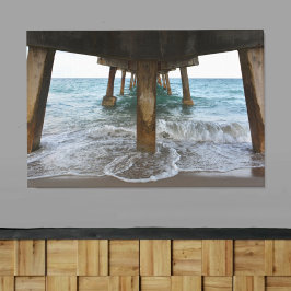Oceanview van onder de pier canvas afdruk