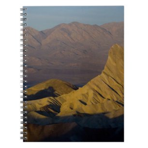 Ochtend eerste licht op Zabriskie Point en 3 Notitieboek