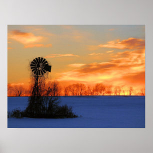 Ochtendzonsopgang met molen in de winter poster