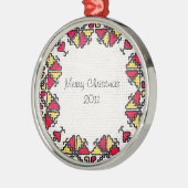 Oekraïense borduurvrouw metalen ornament (Links)