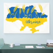 Oekraïense typografie en tarweoor onder Oekraïense Spandoek (Beurs)