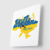 Oekraïense typografie en tarweoor onder Oekraïense Vierkante Klok (Hoek)