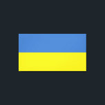 Oekraïense vlag, Oekraïens Slava Ukraini Слава Укр Canvas Afdruk<br><div class="desc">De kleuren van de vlag van Oekraïne, blauw en geel, wapperen al eeuwenlang over een land dat rijk is aan geschiedenis en geest. Blauw staat voor de uitgestrekte Oekraïense lucht, terwijl geel de gouden tarwevelden symboliseert die zich uitstrekken over de vruchtbare vlaktes. Dit eenvoudige maar krachtige symbool is een baken...</div>