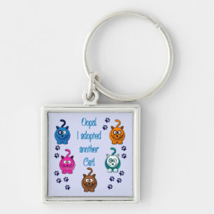 Oeps!  Ik heb nog een kat aangenomen. Sleutelhanger