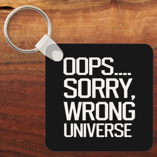 Oeps, sorry, verkeerde wereld sleutelhanger (Voorkant)