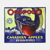 Ogopogo Canadese appelfruitkrateldruk Fleece Deken (Voorkant (Horizontaal))