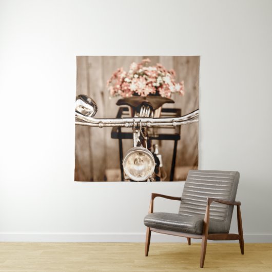 Old bicycle and flowers blur in background process wandkleed (In situ)